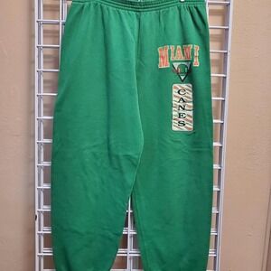 vintage 90s Miami Hurricanes sweatpants with orange accents